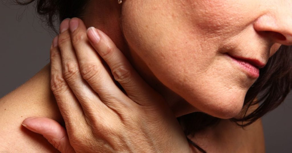 Close up of woman's lower face (model).